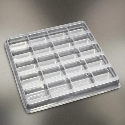 Plastic shipping tray with 2.5" cavities.