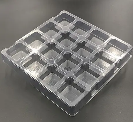 Plastic shipping tray with 2.13" square cavity.