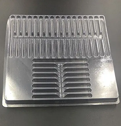 Plastic shipping tray with 5.55" cavities.