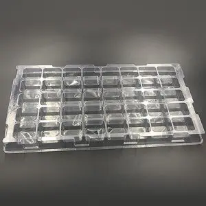 Plastic shipping tray with 2" cavities.
